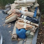 carpet, sawdust, wood etc old carpet, underlay, gripper, bags of sawdust, some short pine boards, a few bags of rubble from fire hearth removal. The whole pile to be taken. KT3
