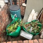 various garden & house waste Mixed garden soil in white sacks, bits of Lino, a reusable compost bin in the far corner, a few bags of garden leaves, some plastic covers, small bits of plasterboard and a large cardboard box. Please take the compost bin to be recycled but the rest is for the dump SW9