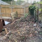 Garden waste.  Unbagged old wood, grass clippings CM23