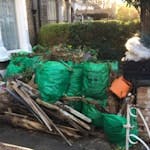 green garden waste in front garden, gardening waste 32bag(don’t collect council bags waste ), woods, one box general waste. N19