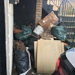 15 bag garden waste & cupboard garden waster plus dismantled desk and broken clothes horse DA9