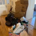 cardboard, baby seat, suitcase 1 baby car seat, 1 old suitcase, 1 bag of cloth, a cardboard pile, 1 bag of miscellanous (glasses, pot, hangers etc). NW6