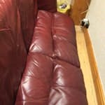 3 seat Leather Sofa and chair 3 seater leather sofa and a chair, it has been dismantled for easier removal the arms and back have bolts that secure them, these are all in place.  The frame is in good condition, just scratches on the seats due to cats. L4