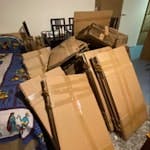 Bulk cardboard taped together Cardboard that has been bundled together in smaller bundles with tape. 

We will need these to be collected from the flat (1st floor, we cannot help with bringing it downstairs but there is a fully functional lift). NW1