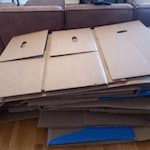 Large stack of thick cardboard About 12 large (2mx1m) cardboard boxes folded flat. KT6