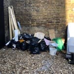 8 Sacks Rubble & Board & Wood Approx 8 x Black Sacks of Rubble, Plasterboard. Also some architrave, wood & Paint pot. See Photo EN2