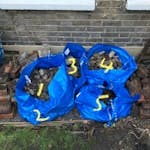 5 bags of rubble + few bricks 5 bags of rubble, each bag is filled less than half full in an ikea bag. it could be carried by 2 people comfortably. it’s currently sitting in our garden, but we can carry to the front of house for the ease of access. there are also a few loose bricks but we will try bag them as well before the collection day. E10