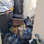 10-15 bin bags of rubbish Several black bin liners outside the front of the property full of rubbish post an end of tenancy clean-out. N16
