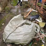 Rubble fridge fure extinguishe Bag of rubble in rear alley. 2x fire extinguishers 1st/2nd floor. Full height lucozade fridge, no door- ground floor.  Various small items 1st floor BB5