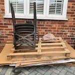 misc to be disposed/ recycled 3x broken plastic chairs, 1x wooden pallet, large pieces of cardboard, bag of broken bricks SM4