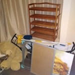 A few appliances with others Mattress, Microwave, toaster, portable medium washing machine, shoe rack, table and 2 chairs, giant teddy bear, big photo frame and lion portrait. E11