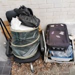 Household and garden waste Office chair, kitchen drawer inserts, cat litter tray, suitcase, desktop, kitchen cabinet doors (two), inline skates, lamp, packaging materials, assorted garden waste (including a washing up bowl, a few bricks, plant pots, etc.) NW1