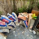 22 bags of rubble plus Bathroom renovation waste: 22 bags of rubble, wooden cabinet, plasterboard, plus some other bits like plastic pipes and other rubbish NW6