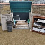 Mostly timber, see photo Mostly timber, some plastic, some glass, some cast iron. A wooden bookshelf and general waste, inc. gripper strip, 10L paint pot, paint tray e.t.c.  Plastic store cupboard NOT included. W13