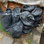 rubbish about 15 light weight bags , mostly household rubbish, including couple bags of wallpaper that I have removed from walls E14